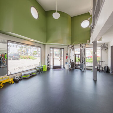 Move Your Mountain gym inside looking out windows.