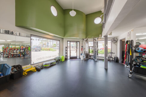 Move Your Mountain gym inside looking out windows.