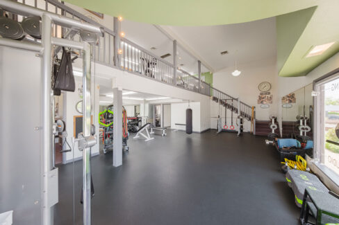 Move Your Mountain gym with equipment and punching bag.