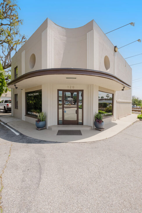 Move Your Mountain exterior shot full front of building.